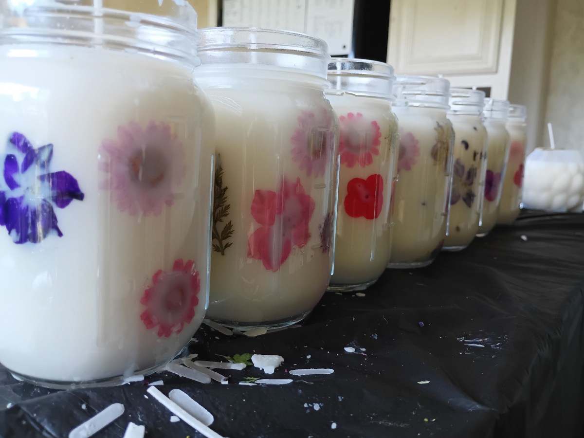 Seven 16oz soy peach scented flower&nbsp;candles